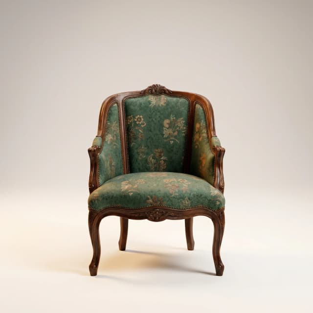 Victorian damask chair with intricate carved details.