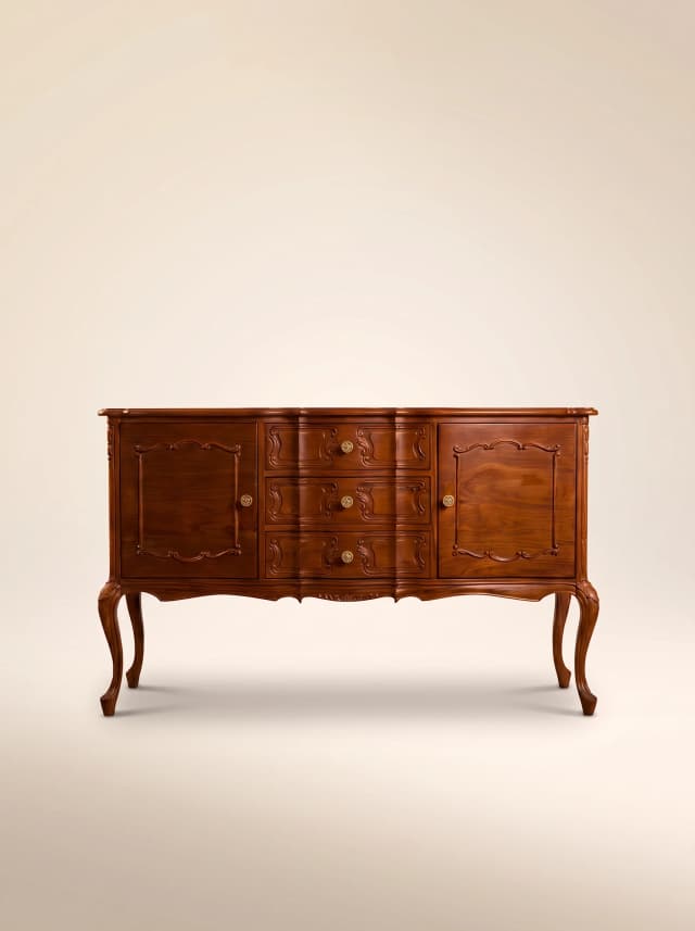 Teak wood credenza with drawers and cabinets, featuring a classic Victorian-style design.