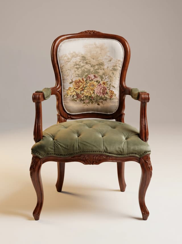 Victorian armchair with floral upholstery on teak wood frame with carved details.