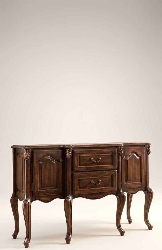 The Winchester Teak Sideboard, a stunning example of Victorian elegance, made from durable teak wood, showcasing ornate carvings and ample storage, perfect for a luxurious dining room or living area.