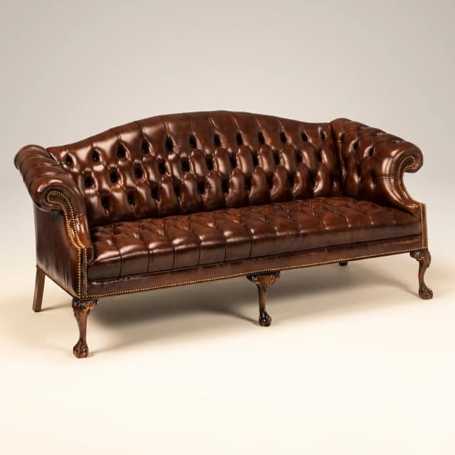 The Baskerville Sofa, a majestic example of teak wood refinements in a classic Victorian sofa design.